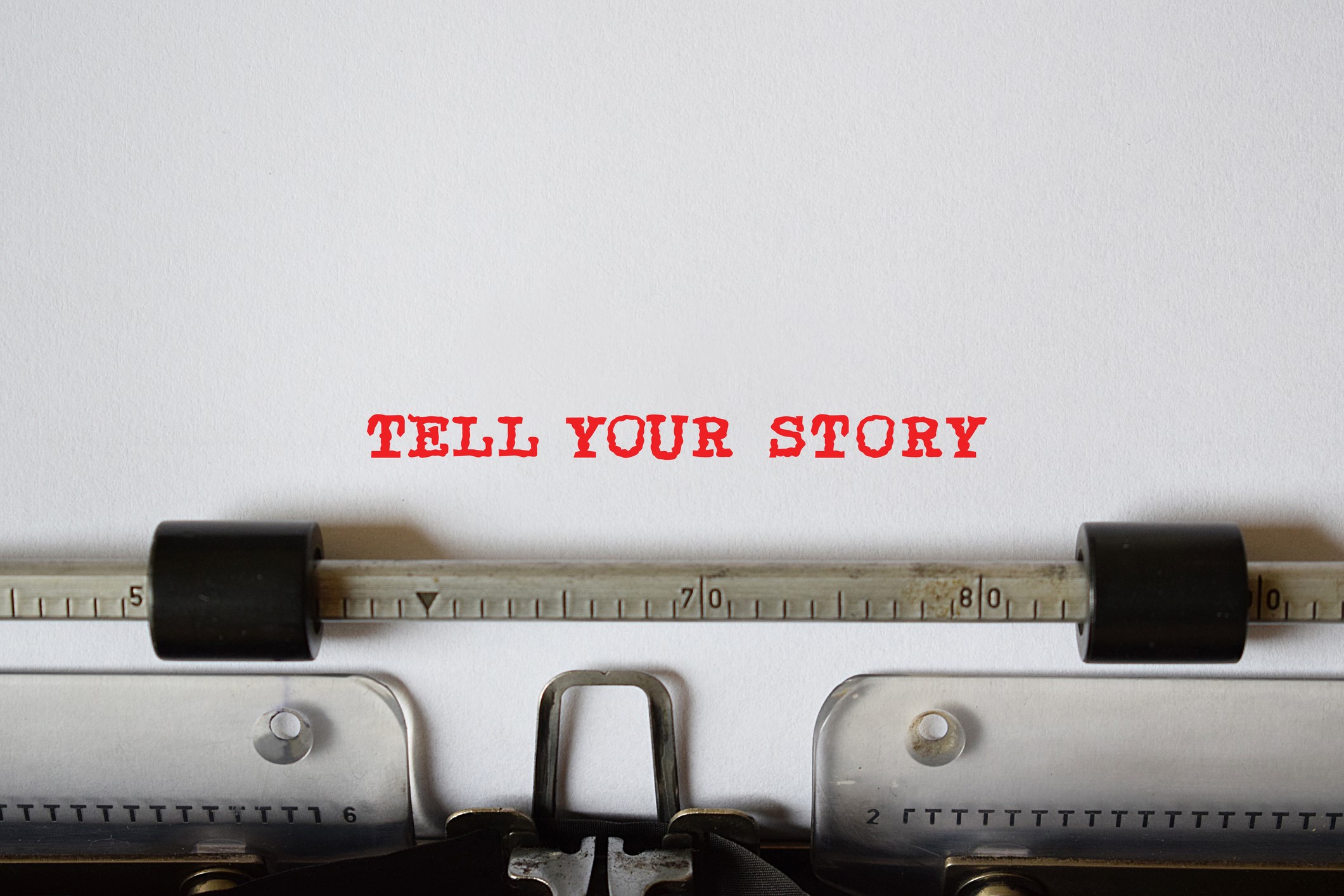 TELL YOUR STORY - typed on retro typewriter is photo made with unique words.