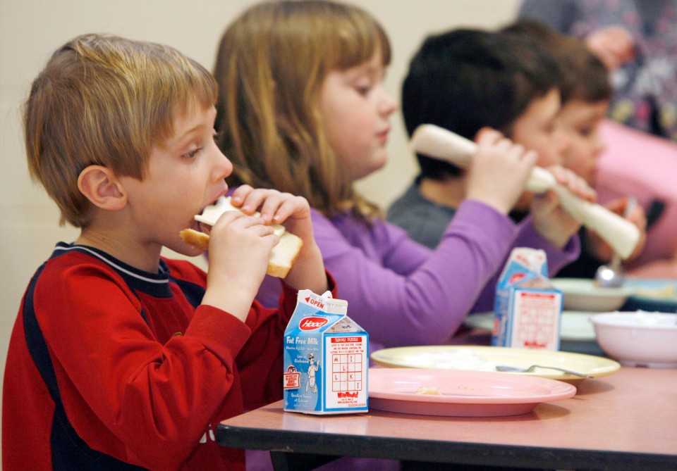 students eating lunch at Sharon Elementary School in Sharon, Vt. Toby Talbot / AP Photo
