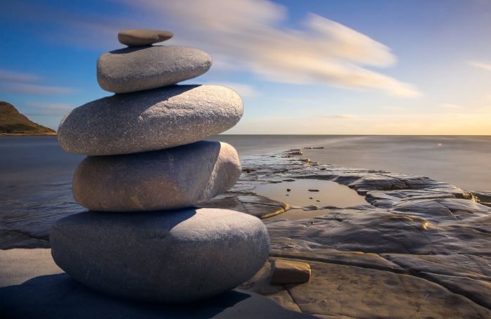 stack of large rocks on edge of rocky coast.Photo from Pexels Pixabay